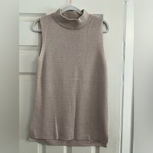 Banana Republic sleeveless turtleneck.